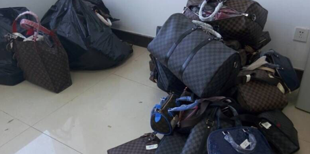 烟台查获百余件LV商标侵权商品 多为女士手包和钱包